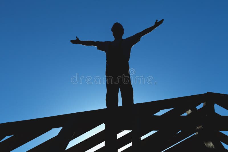 Worker welcoming the sun starting the workday stock photography