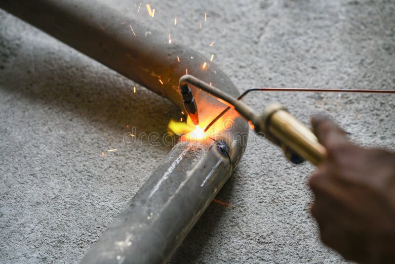 Worker Welding Joint Steel Exhaust Pipe Car. Stock Image Image of