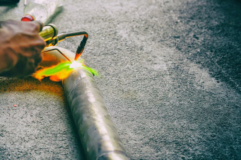 Worker Welding Joint Steel Exhaust Pipe Car. Stock Image Image of