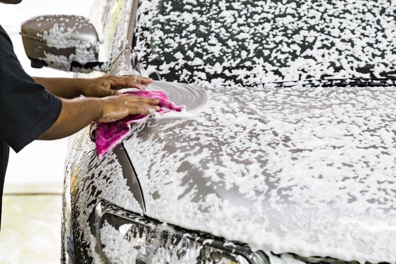 Worker Wipe Clean Car Using Detergent Soap Foam with Cloth Stock Image Worker Wipe Clean Car Using Detergent Soap Foam with Cloth Stock Image