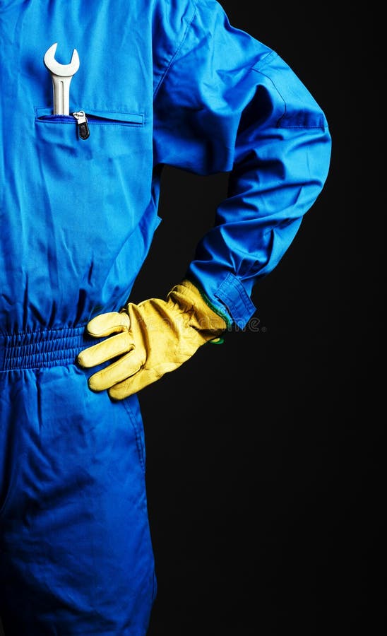 Worker with wrench in his pocket