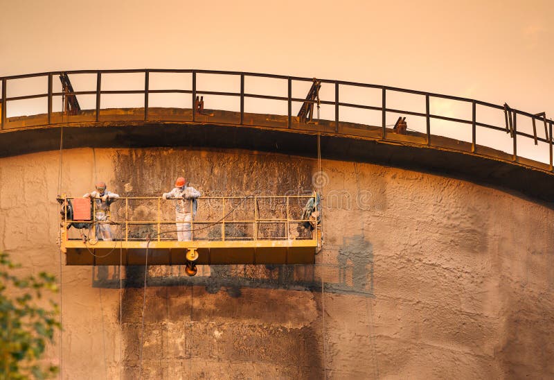 Workers on the cooling tower stock photo