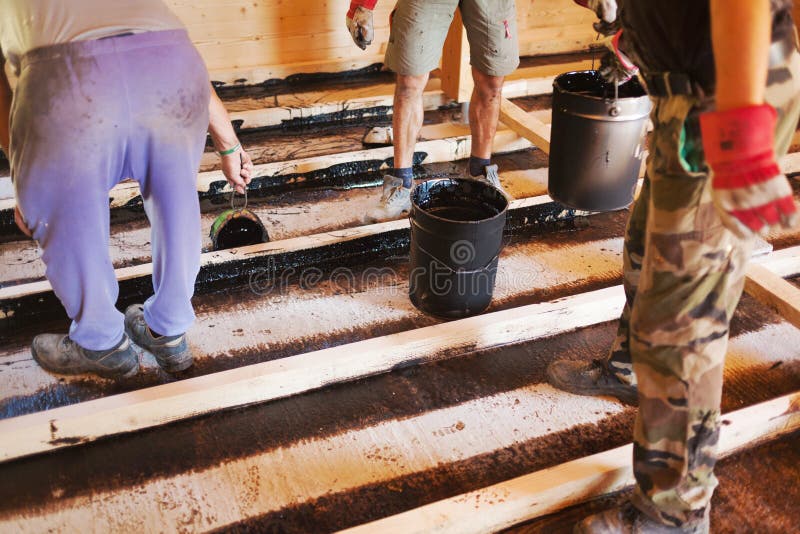 Workers installing a house foundation stock photography Workers installing a house foundation stock photography