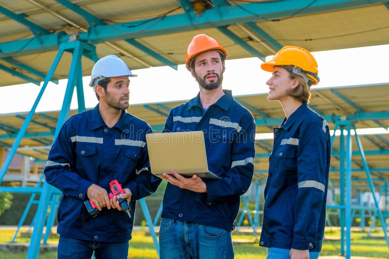 Workers Installing Solar Panels, Engineer Team at Solar Panel Farm