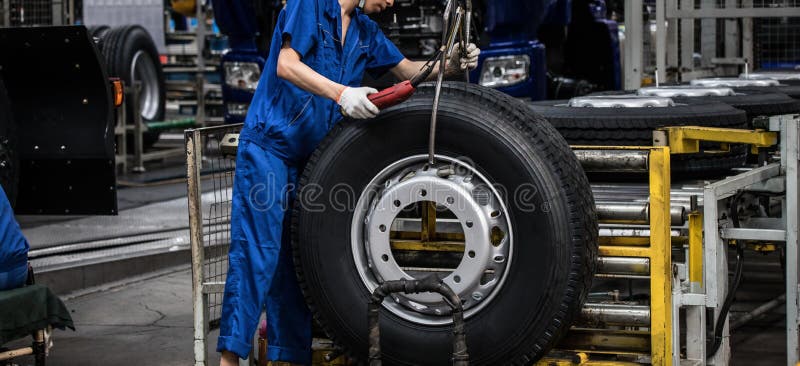 Workers in machinery factory in China. royalty free stock photography