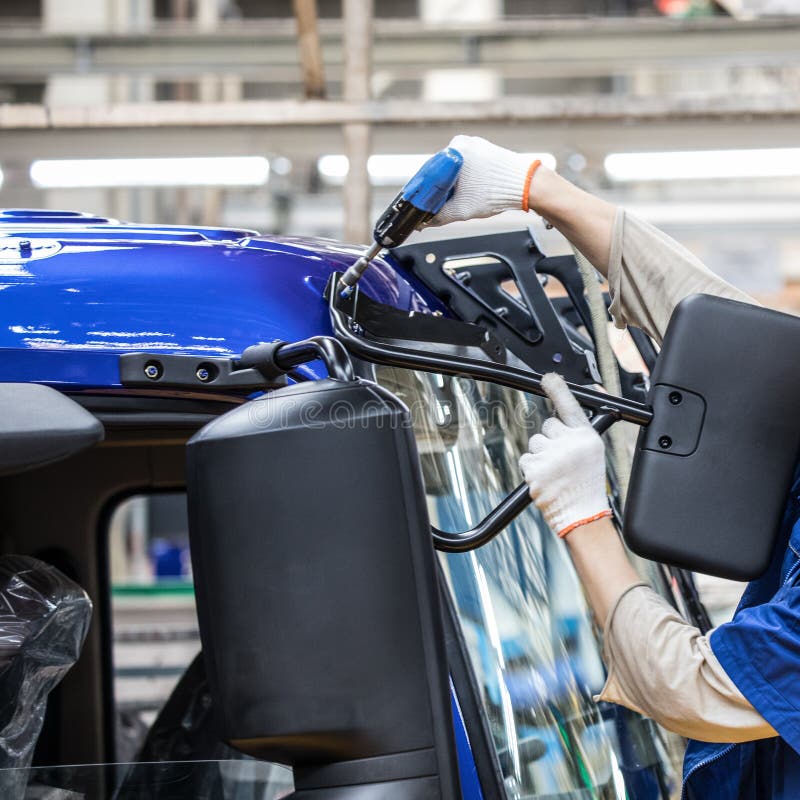 Workers in machinery factory in China. royalty free stock photo