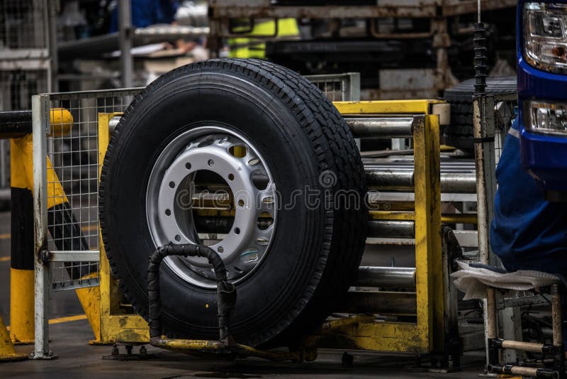 Workers in machinery factory in China. stock images