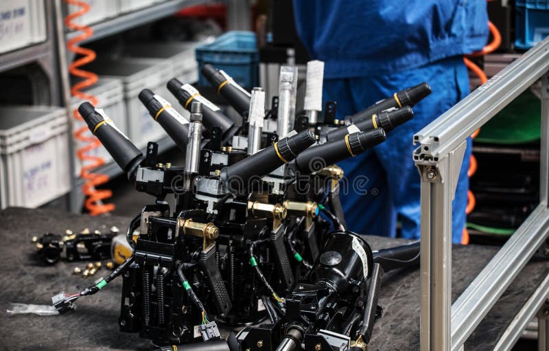 Workers in machinery factory in China. stock photography