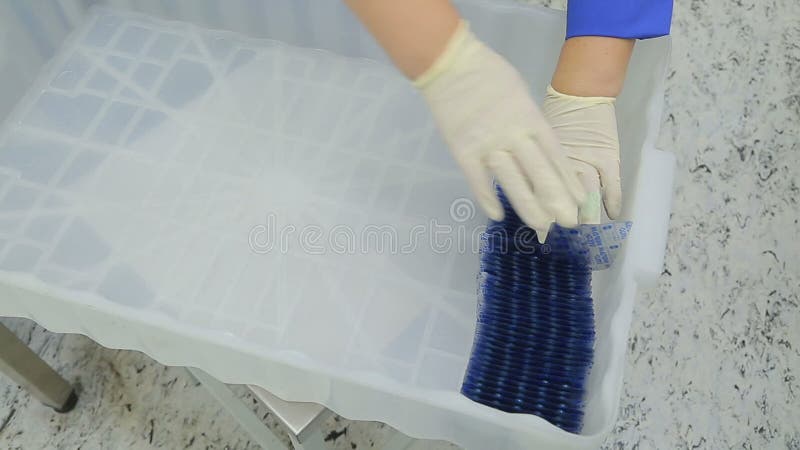 The workers of the pharmaceutical factory sort of blisters stock video