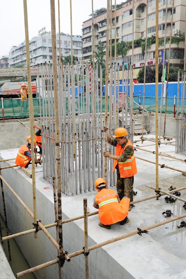 Workers on the Reinforced concrete pile caps royalty free stock image