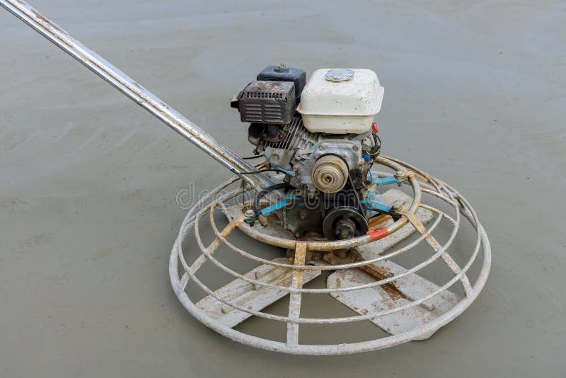 Workers are Using Concrete Polishing Machines for Cement after Pouring
