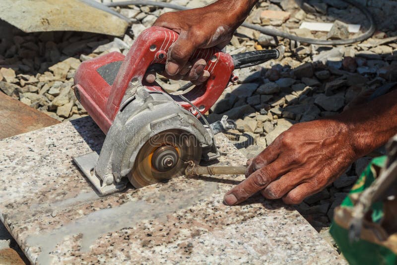 Workers are Using Stone Cutting Tools. Stock Photo Image of gray