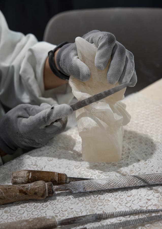 Working on Alabaster Sculpture. Stock Photo Image of carving, decor
