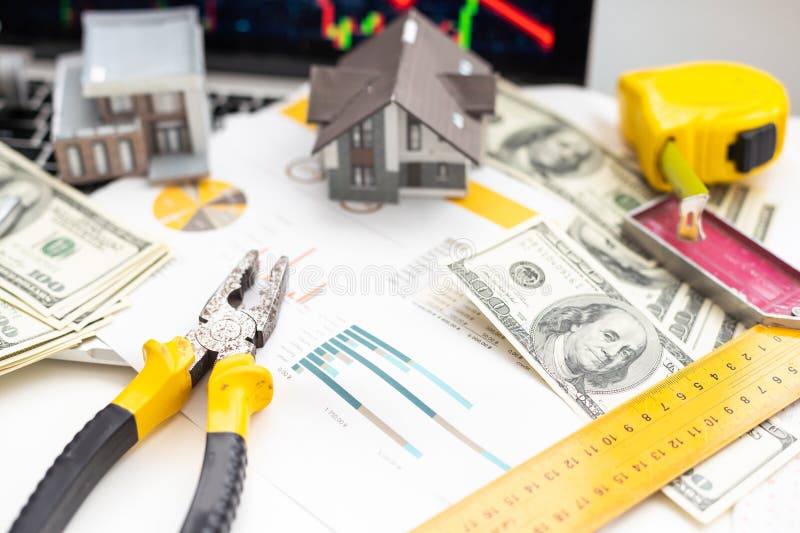 Working on Construction Project Background. Office Table with Dollars