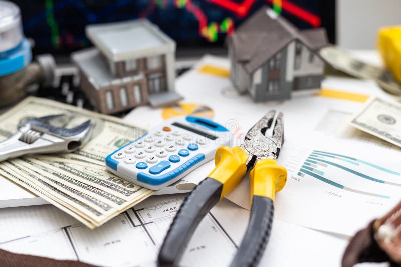 Working on Construction Project Background. Office Table with Dollars