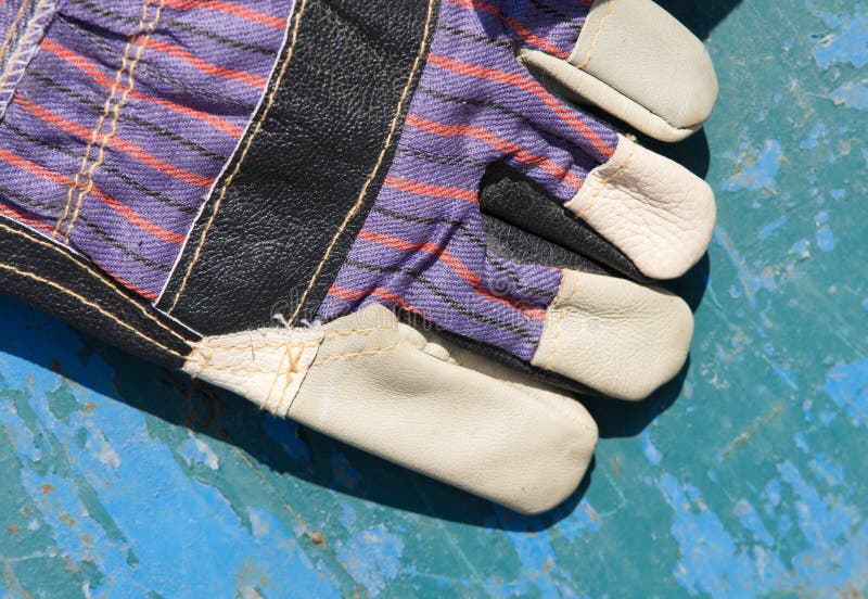 New protective gloves on blue board. Pair working gloves stock images, royalty-free photos and pictures