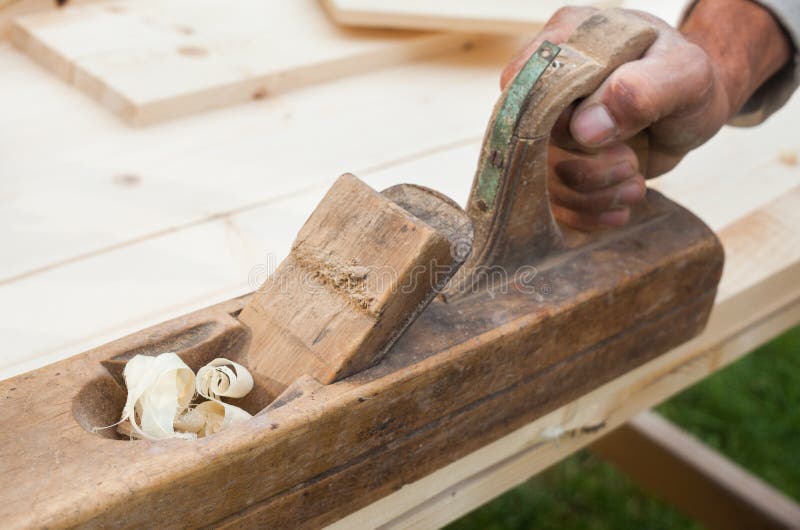 Working with Hand Plane. Joiner`s Carpenter`s Tool Stock Photo Image