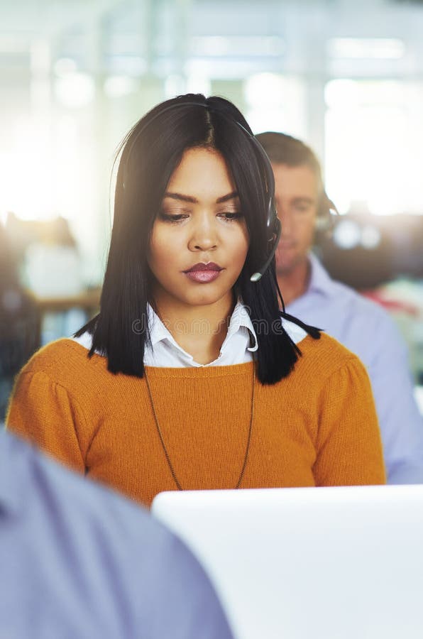Working Hard To Help Every Caller. Cropped Shot of People Working in Their Office. Stock Image