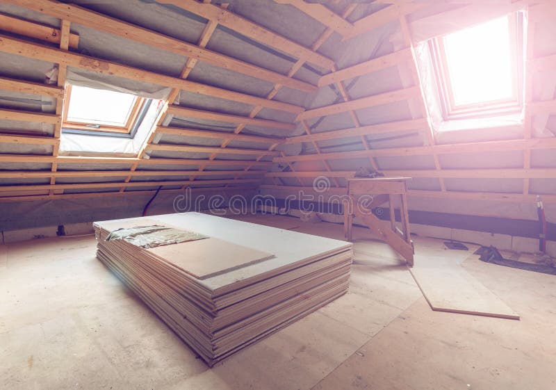 Working process of installing plasterboard or drywall for making gypsum walls in apartment is under construction stock photo