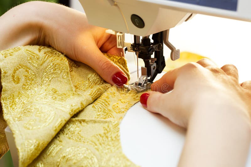 Working on the Sewing Machine Stock Photo Image of fabric, fiber