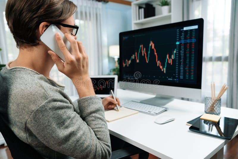 Investors calling to broker for stock exchange on pc with laptop. Pecuniary. royalty free stock photography