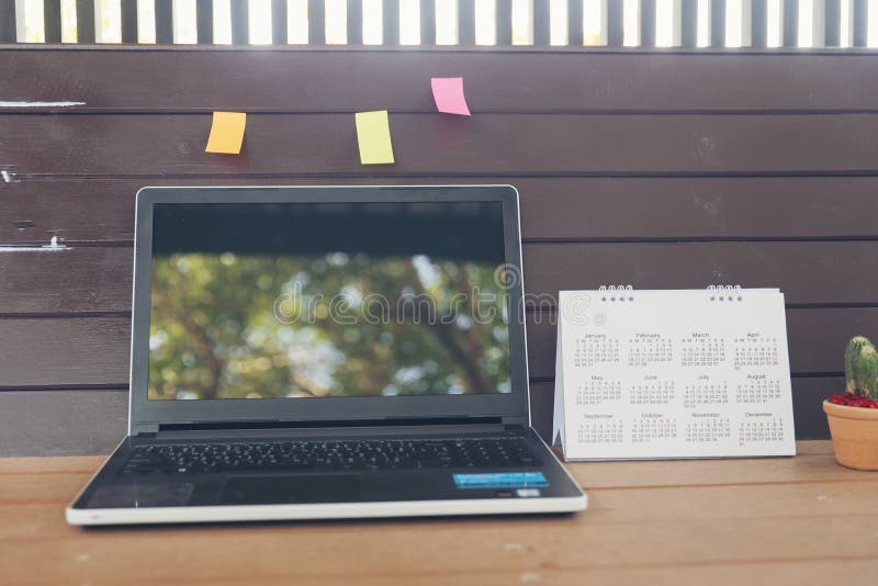 Office desk with Desktop laptop,Calendar 2019 on wooden desk.Urban Lifestyle concept