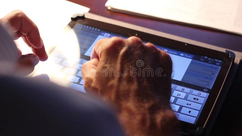 Man working with a tablet.
