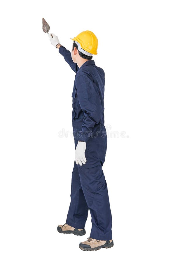 Workman with blue coveralls and hardhat in a uniform holding ste