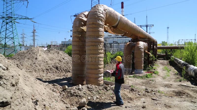 Workman at heat power plant