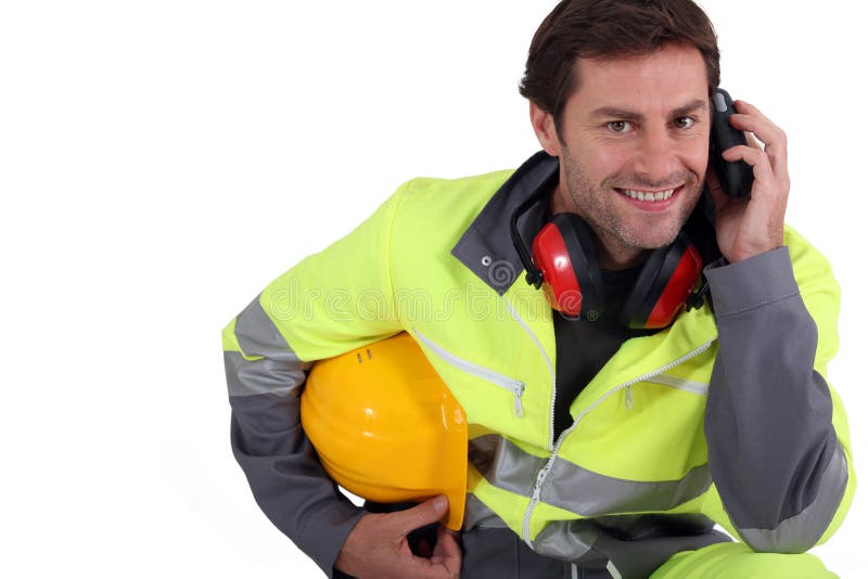 Workman in protective gear stock image. Image of mobile 23698015