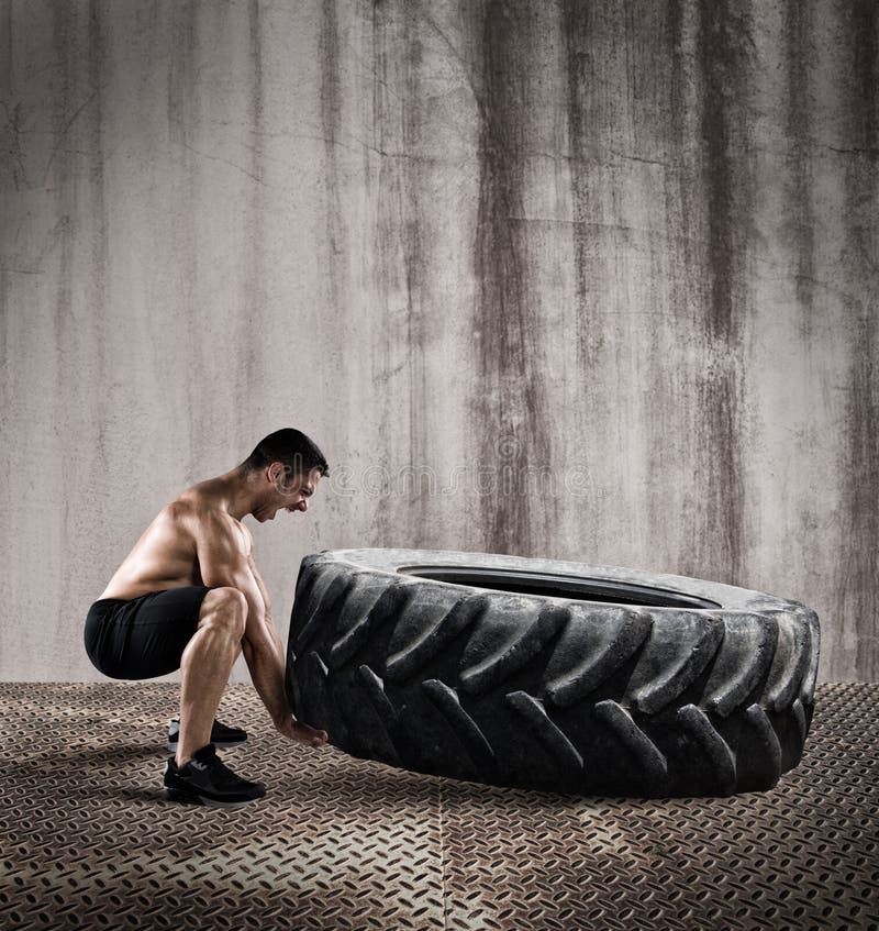 Workout with a big tire stock image. Image of healthy 92141957