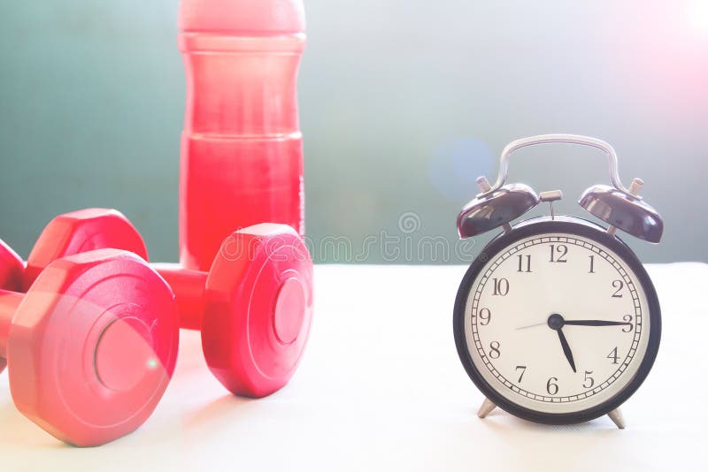 Workout and Healthy Lifestyle Concept with Alarm Clock Stock Image