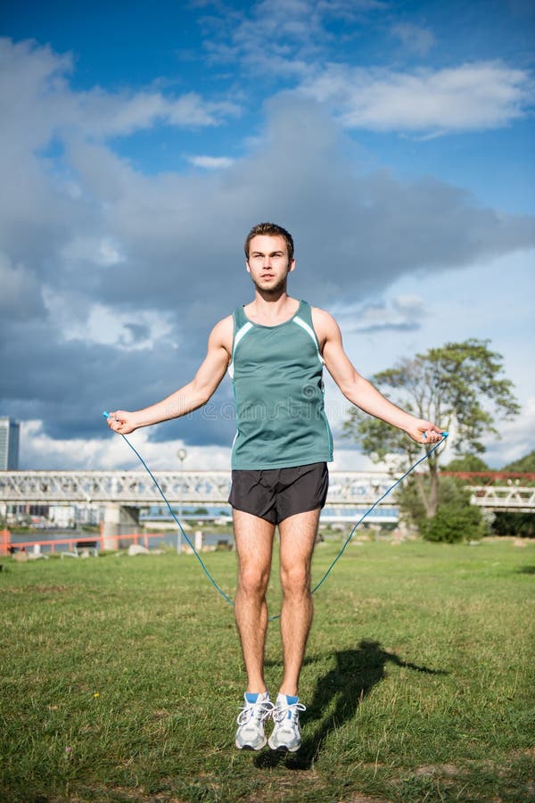 Workout with skipping rope stock image. Image of slim 26451531