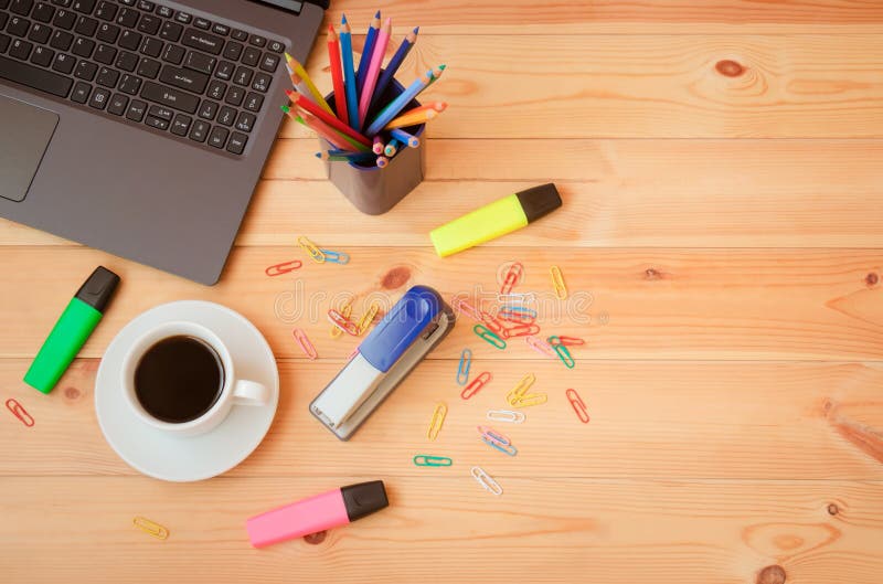 Keyboard, Coffee Cup and Office Supplies on Wooden Table. Top View