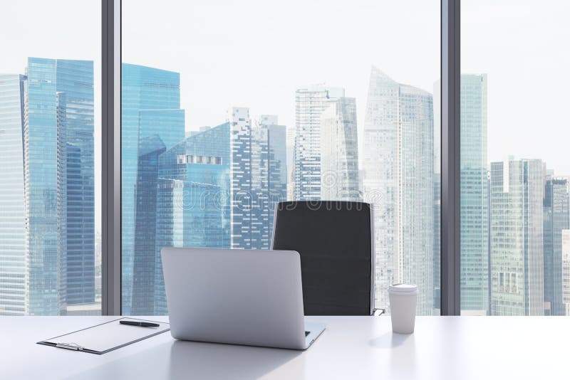A workplace in a modern panoramic office with Singapore view. stock image