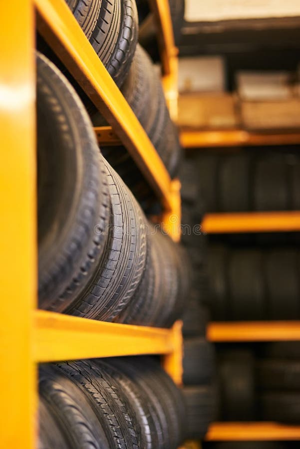 Full of Wheels. Closeup Shot of a Pile of Car Tyres. Stock