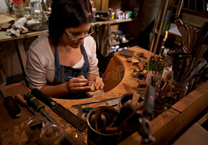 The workspace that artisans dreams are made of. An artist creating something out of wood. stock photo