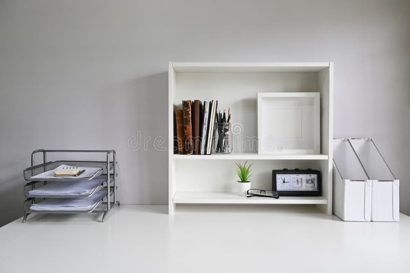 Workspace Shelves with Camera, Lens with Photo Frame and Coffee Mug on