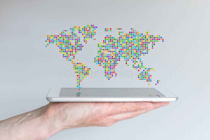 World map floating above a modern smart phone or tablet. Hand holding mobile device in front of grey background.