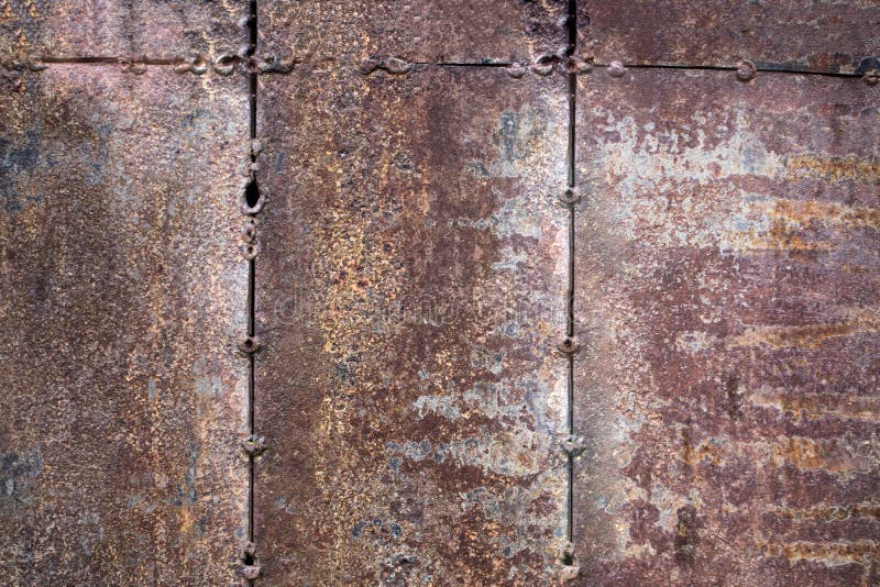 Worn dark brown rusty metal texture background. the concept of t royalty free stock images Worn dark brown rusty metal texture background. the concept of t royalty free stock images