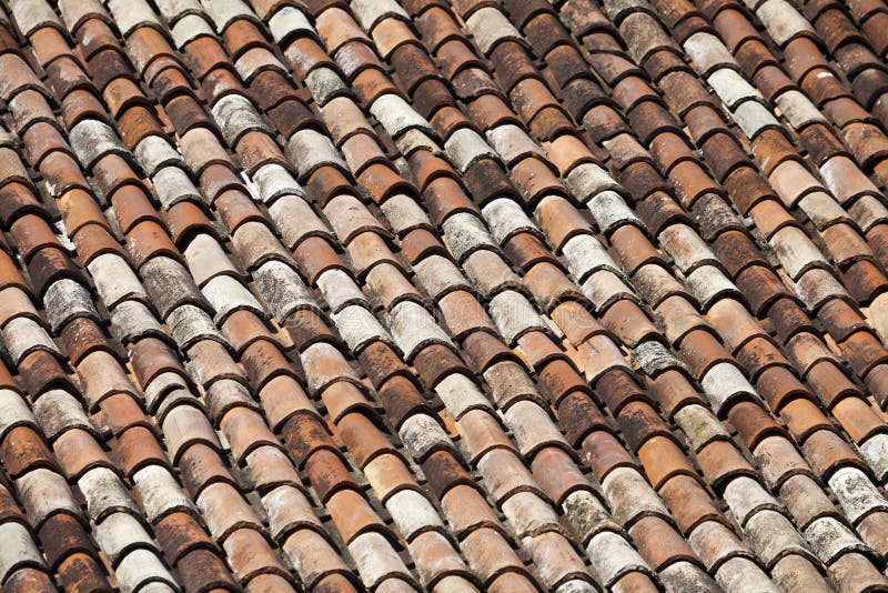 Worn orange tile roof. stock photo. Image of picturesque 122776574