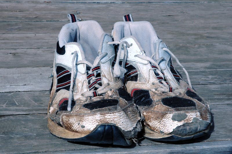 Worn out running shoes stock photo. Image of jogging - 12276380