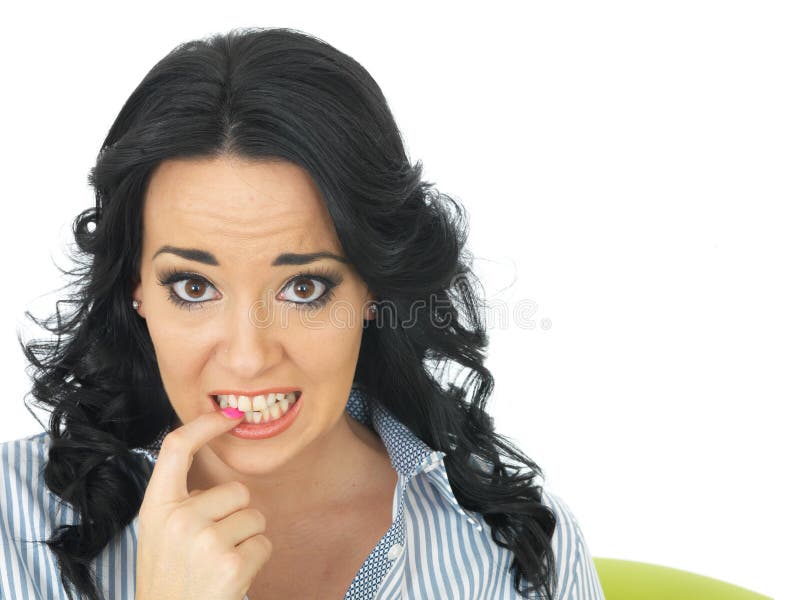 Worried Anxious Confused Young Woman Biting her Nail