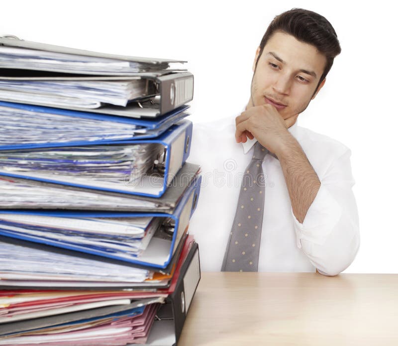 Worried businessman with folders stock photography