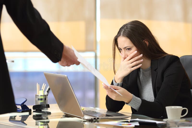 Worried businesswoman receiving notification stock photos Worried businesswoman receiving notification stock photos