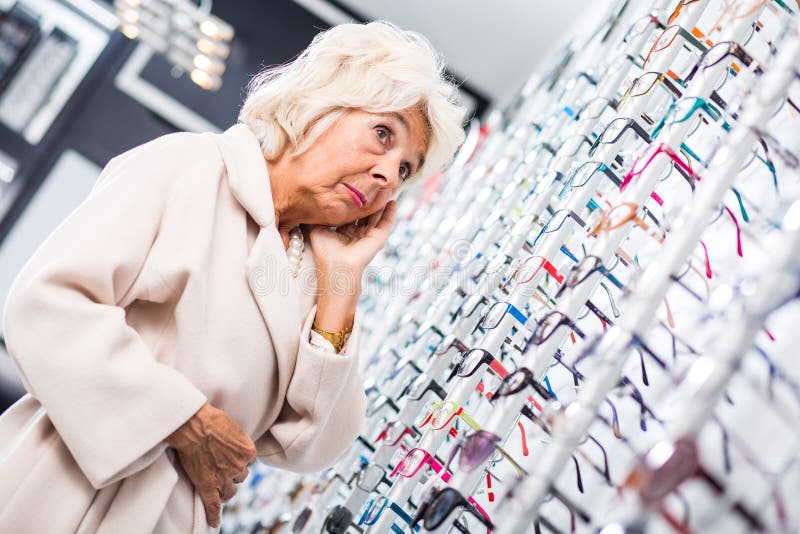 Worried woman in optical shop