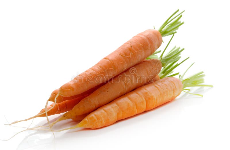 Fresh carrots over white background. Fresh carrots over white background