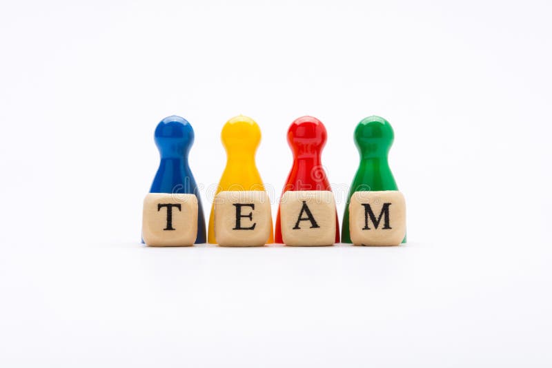 Wortteam auf Holzklötzen und Pfand in den verschiedenen Farben auf weißem Hintergrund stockfotos Wortteam auf Holzklötzen und Pfand in den verschiedenen Farben auf weißem Hintergrund stockfotos