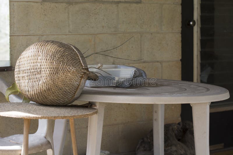 Woven basket and tables stock image. Image of rests 143199419