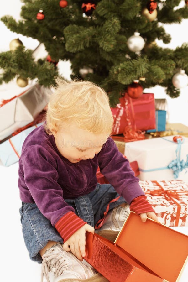 Wow - Surprised kid opening christmas gifts